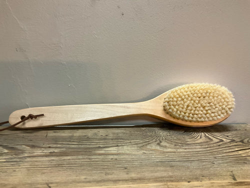 Picture of wood bath brush with leather tie