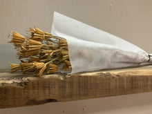 Load image into Gallery viewer, Dried natural love in a mist bunch laying in a wooden table
