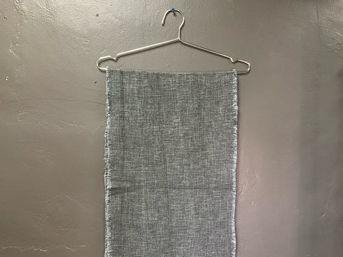 Product shot of linen blend table runner with frayed edges - charcoal