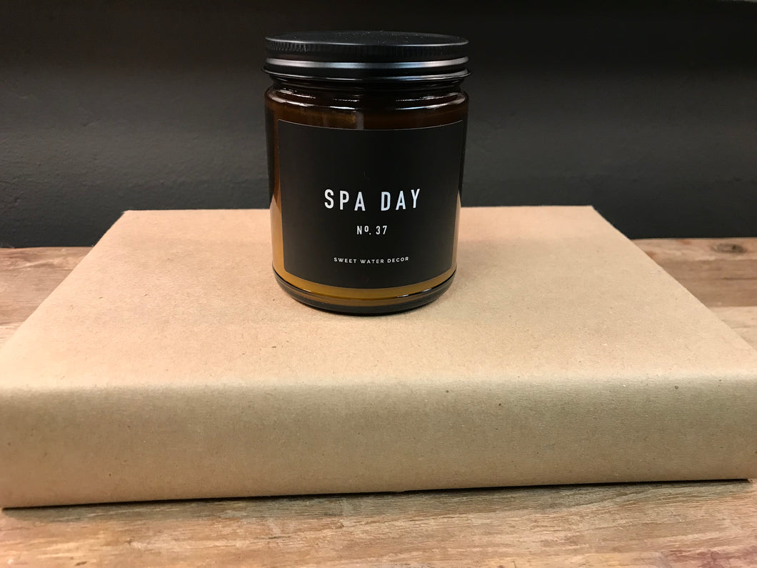 Closeup shot of spa day soy candle | amber jar candle